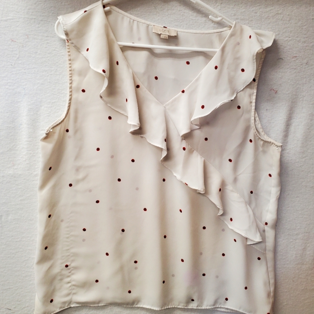 Sleeveless white top